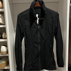 Lululemon black windbreaker with hidden hood - size 4